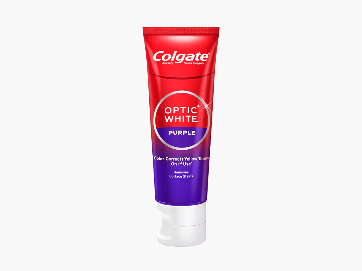 Colgate Optic White Purple Toothpaste featuring a color-correcting formula that neutralizes yellow tones and enhances brightness for visibly whiter teeth after the first use.