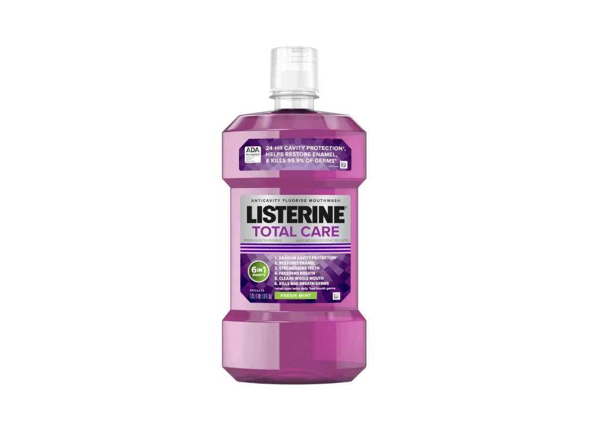 Bottle of Listerine Total Care anticavity fluoride mouthwash in a purple container, designed to help protect against cavities and strengthen enamel